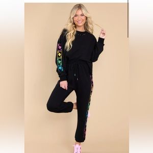 QUEEN OF SPARKLES Black Sweatshirt with Colorful Sleeve Accents